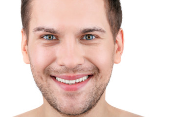 Obraz premium Handsome young man with joyful smile