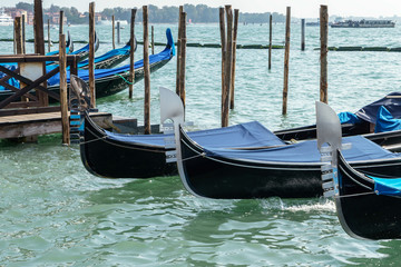 Gondolas moored at the entrance to the Grand Canal