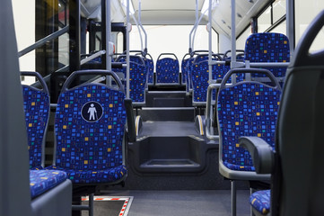 Bus inside, city transportation white interior with blue seats in row, retirement places, open...
