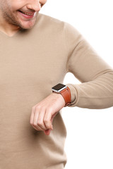 Fototapeta premium Cheerful guy is checking time