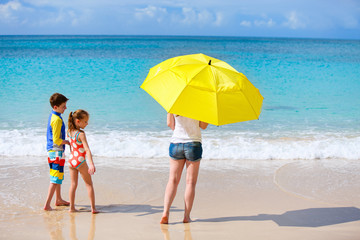 Mother and kids at tropical beach