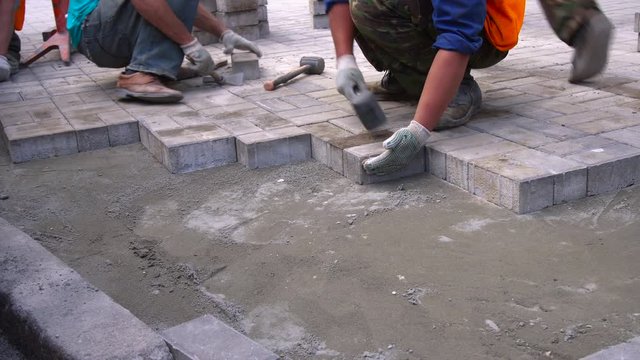 Workers Laid Pavement