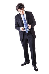 Obraz na płótnie Canvas young businessman with tablet