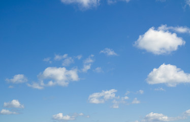 Naklejka na ściany i meble Heaven. White heap clouds in the blue sky. Cloudscape.