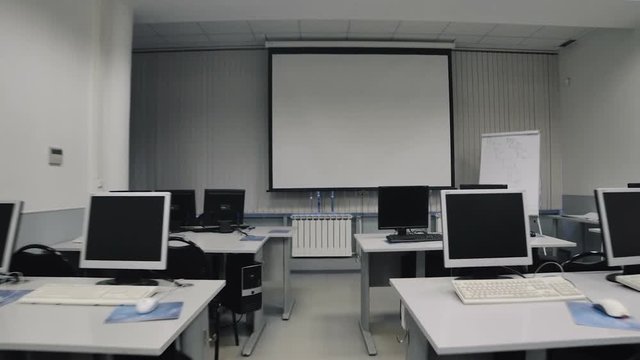 Classroom with computers. Steadicam fly thru auditorium