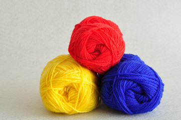Colorful balls of wool isolated on a white background