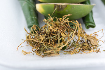 Chewing betel nut and betel leaf