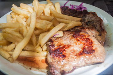 Argentinian steak in a restaurant in Mendoza, Argentina