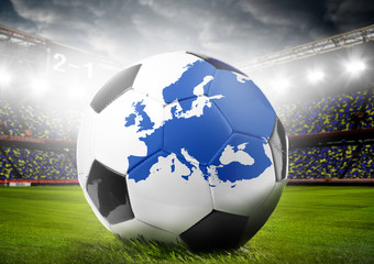 Fototapeta na wymiar stadium and soccer or football ball with map of Europe. Continent shape is altered one from visibleearth.nasa.gov