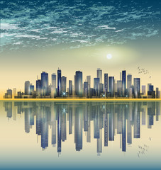 Modern night city skyline at sunset, with reflection on water surface