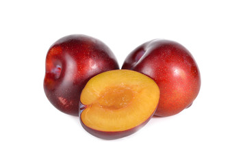 Fototapeta na wymiar ripe ruby plum fruit on white background