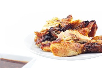 Grilled chicken on white dish