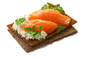 Bread crisp with salmon, soft cheese and chervil