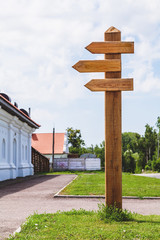 Wooden direction sign post