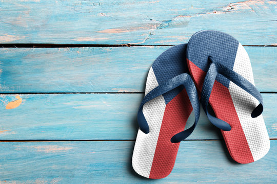 Thongs with flag of Czech Republic, on blue wooden boards