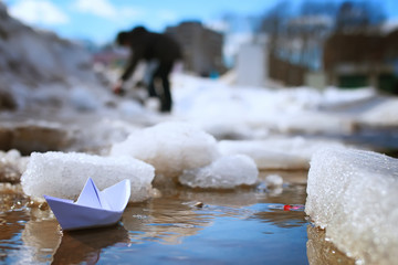 tinted photo paper boat on spring street