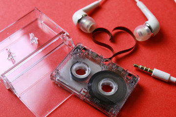 cassette with tape shape heart on red