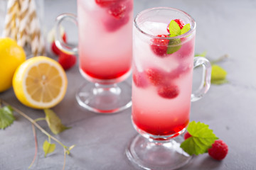 Pink raspberry lemonade in tall glasses