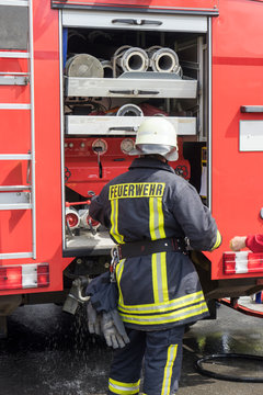 firefighter / Firefighter on a fire truck