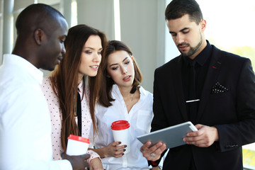 Business team discussing together business plans