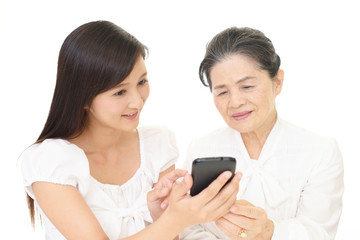 笑顔の二人の女性