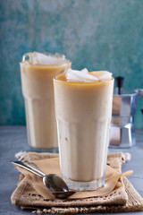 Iced coffee with milk in tall glasses