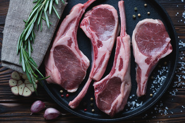 Top view of raw fresh lamb chops ready to be cooked, close-up