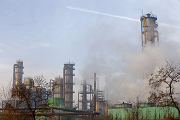 Fototapeta na wymiar Steel mills Smoke and powder dust pollution in large industrial