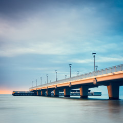 Concrete pier in Kolobrzeg, long exposure shot at sunset