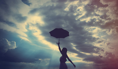 young woman with  umbrella © Masson