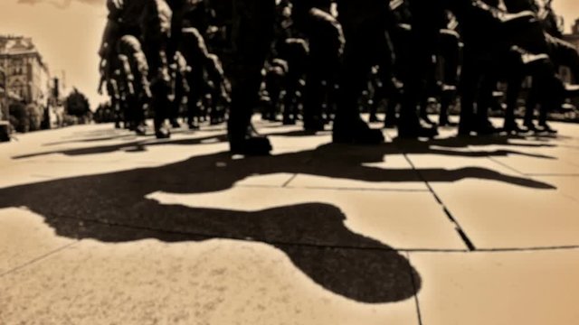 Military troops marching on the city street