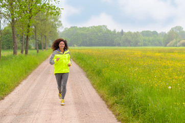 Fototapeta premium Fit young woman enjoying her morning run