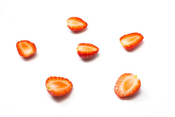 Red berry strawberry isolated on white background. Strawberry isolated on white. Sweet strawberries. Food for health. Slices of strawberry on white. Juicy strawberries for packaging. Eco-friendly food