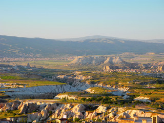 The peaks of volcanic tuff, which are covered with basalt.