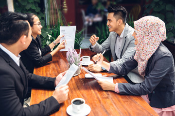 Business meeting in a cafe