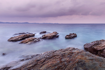 Long exposure shot. Sea scape with stone beach at Thailand