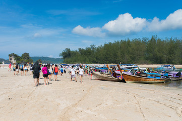 Passengers boarding ship at Ao nang beach to hong,poda,chicken,tub and phiphi island, Krabi. thailand.
