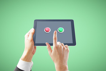 Tablet with buttons green background
