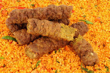 Lamb Koftas On A Spicy Couscous Background