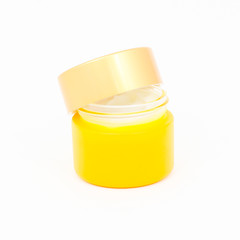 Cosmetic cream bottle isolated on white background