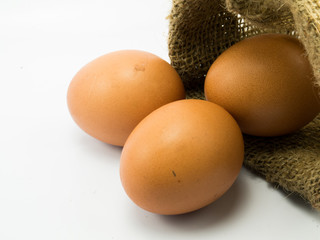 Egg in a sack on white background