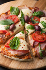 Delicious pizza with bacon and mozzarella cheese