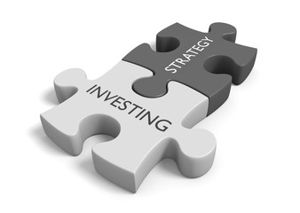 Two connected puzzle pieces with the words investing strategy