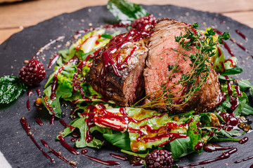 Juicy Beef rump steak from marble beef medium rare with spices a