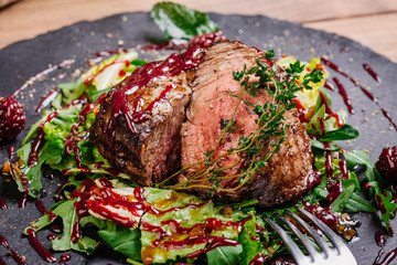 Juicy Beef rump steak from marble beef medium rare with spices a