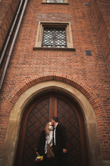Fototapeta premium Loving couple posing in the old town