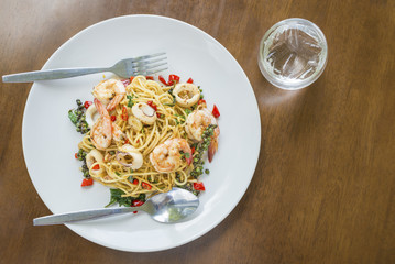 spaghetti seafood with spices, herbs of Thailand delicious food hot and spicy Thai as Italian mix style.