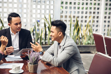 Business meeting in a cafe