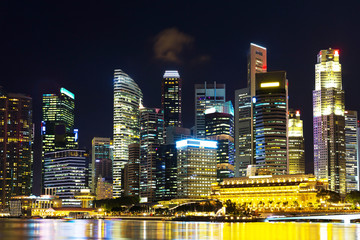 Landscape of the Singapore financial district and business buildings in lights at night