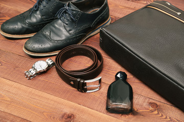 Collection of man's business accessories and clothes.